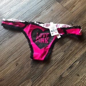 Hot pink and black extra low rise thong